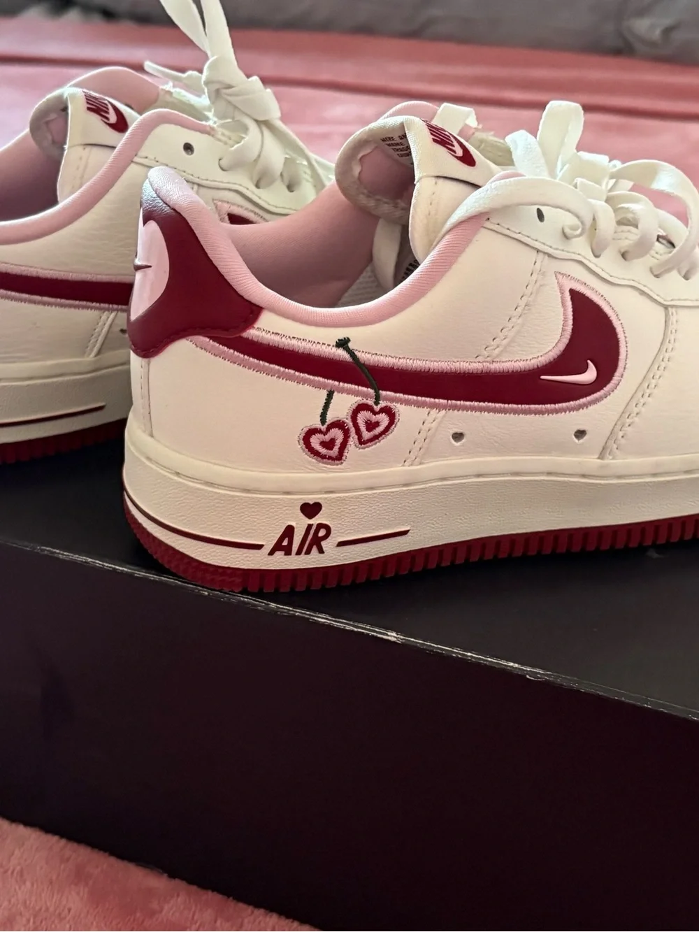 Nike Kids White and Pink Low-Top Sneakers with Maroon Swoosh